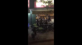 The drunken man fighting with another group on the street in Ha Noi
