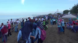 Thousands of students and soldiers cleared the Padang Beach resort area
