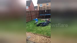 Hilarious moment UK dad slide tackles 4-year-old son