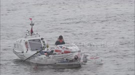 Andy Hodgson on the River Thames leaving London at the start of his solo attempt to row around the British Isles