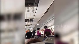 Video captures chaos inside plane after co-pilot is nearly sucked out of cockpit window