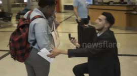Man proposes to girlfriend at Atlanta airport