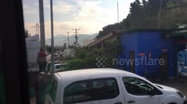 Albanian man climbs electrical mast like a monkey