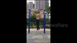 It's the hanging moonwalk! China's best body-popping dancer tackles high bar