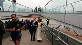 Alternative Royal Wedding crosses Millennium Bridge