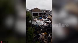 Rogue fly-tippers dumped tonnes of rubbish at an abandoned garage, leaving it in such a state it looked like the 'Apocalypse'