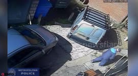 A bungling armed robber ran into a parked van while trying to flee with a cash box - because he had pants on his head