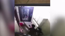 Horror moment huge door comes crashing down on little girl