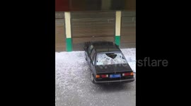 Hailstones the size of tennis balls damage vehicles in northwest China