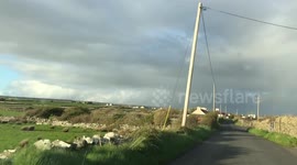 Irish countryside, green grass and cloudy sky