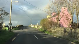 Irish countryside, green grass and cloudy sky