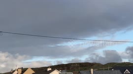 Irish countryside, green grass and cloudy sky