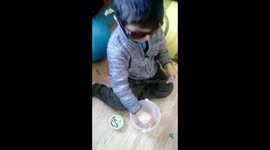 Kid is playing with SLIME