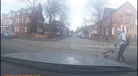 What was she thinking? Manchester cyclist rides into path of motorist before stopping and GETTING OFF bike