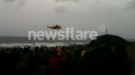 Coastguard helicopter landing on the downs (Bude Lifeboat day)