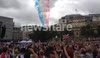 Red arrows fly over cheering crowds in trafalgar square