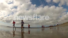 Ground level shot of beach run during Cornwall Festival of Sport