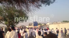 crazy police car driver going into bedon protests in Kuwait