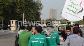 Young Egyptians gather before march to Tahrir Square