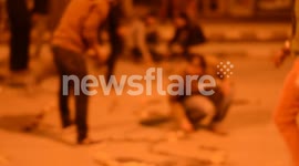 Young Egyptians write 'Leave Morsi' in stones outside Presidential Palace