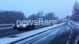 Snow creating hazardous driving conditions