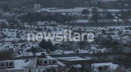 SNOWY ROOFTOPS