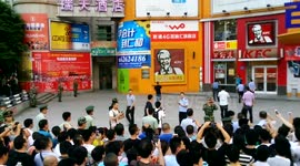 Man holds hostage at knife point in busy square