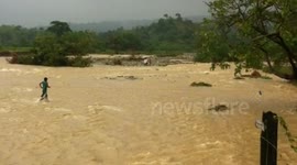 go cross a river in the Philippine because of broken bridge