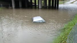 Car submerged in floodwater in southern Sweden