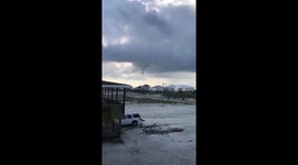 @NWSMobile @rzweather funnel cloud on Dauphin Island now https://t.co/hW1Ic7mHpC