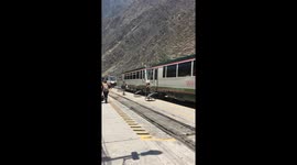 Incatrail Train passes on the way to Machu Picchu, Peru