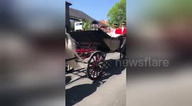 US student gets up-close view of Harry and Meghan as carriage passes right in front of her