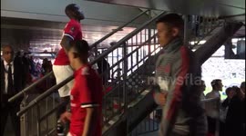 Man United players go up to collect the runners-up medals at the cup final