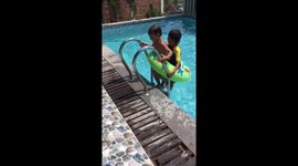 Hilarious sibling antics in a rubber ring: double trouble and when teamwork makes the dreamwork