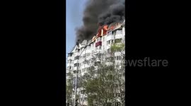 Massive fire sweeps through residential building in Russia
