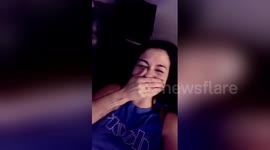 Mom’s reaction after dog gently bites her mouth will make you laugh out loud