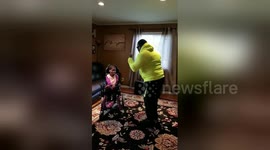 Heartwarming moment dad dances to make his special needs daughter smile