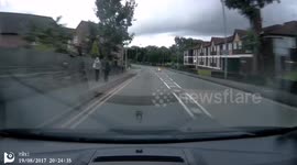 Motorbike over taking round an island.