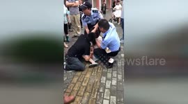 Police teargas woman who bit boyfriend's tongue and refused to let go