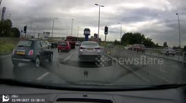 Near miss on roundabout motorway junction.