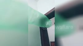 Chinese tenant creates homemade air conditioner out of plastic bags