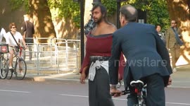 Man In Strange Outfit In The Mall