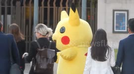 Fallen on hard times? Pikachu seen begging in London's Trafalgar Square