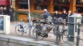 Man does tricks on mobility scooter in Amsterdam