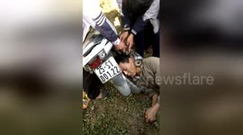 'Drunk' man wakes up with head stuck in motorcycle exhaust