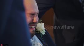 Touching moment a wheelchair-bound groom is overcome with emotion as his bride walks down the aisle