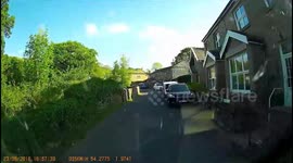 Item falls off vehicle in front of bus