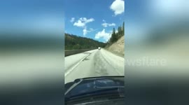 Incredible moment plane crash-lands on US highway