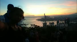 Beautiful sunset in Victoria Harbour seen from Braemar hill peak
