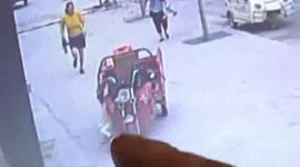 Hero shop owner dives in front of runaway 3-wheeler to rescue toddler